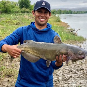 Jordan Rodriguez shows off a large channel catfish