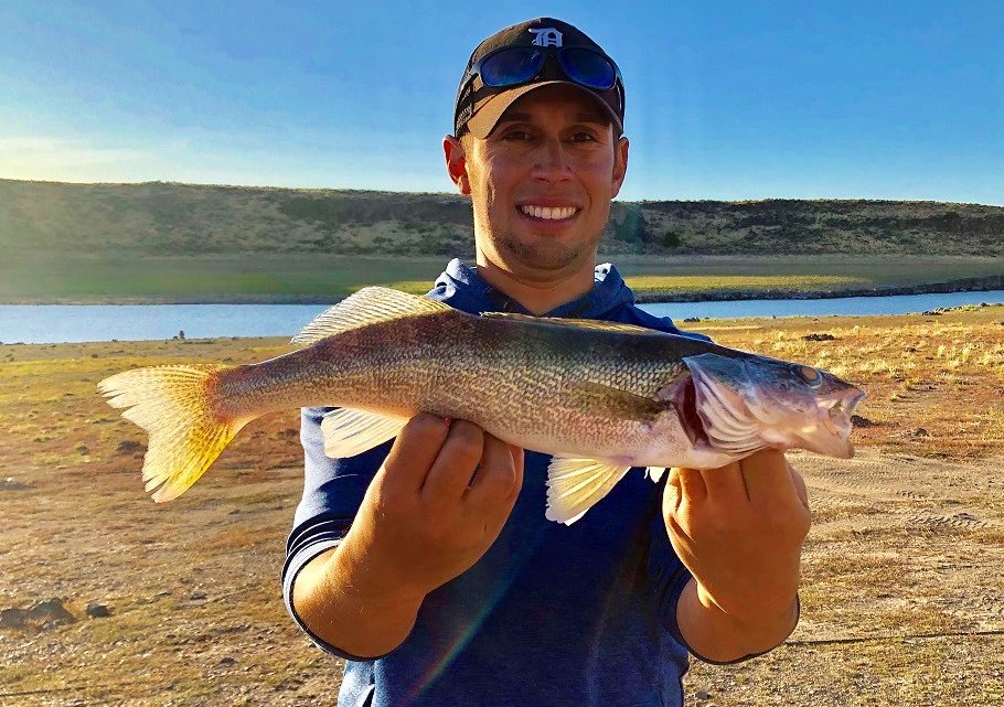 Jordan Rodriguez shows off a walleye caught at Salmon Falls Creek Reservoir.