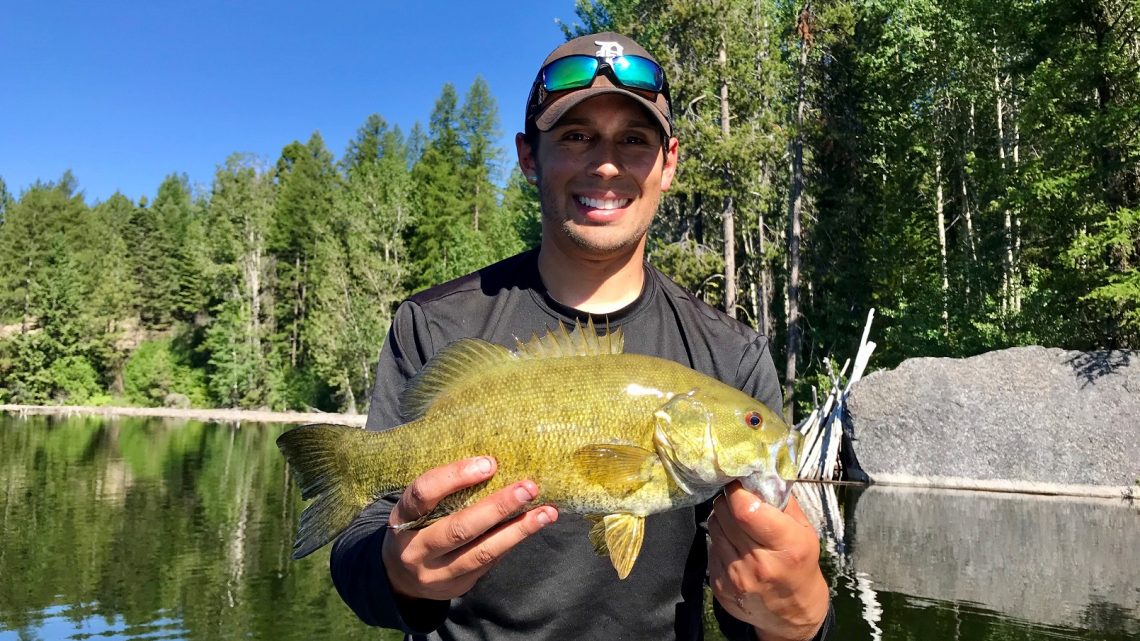 Jordan Rodriguez shows off a big smallmouth bass caught at Little Payette Lake