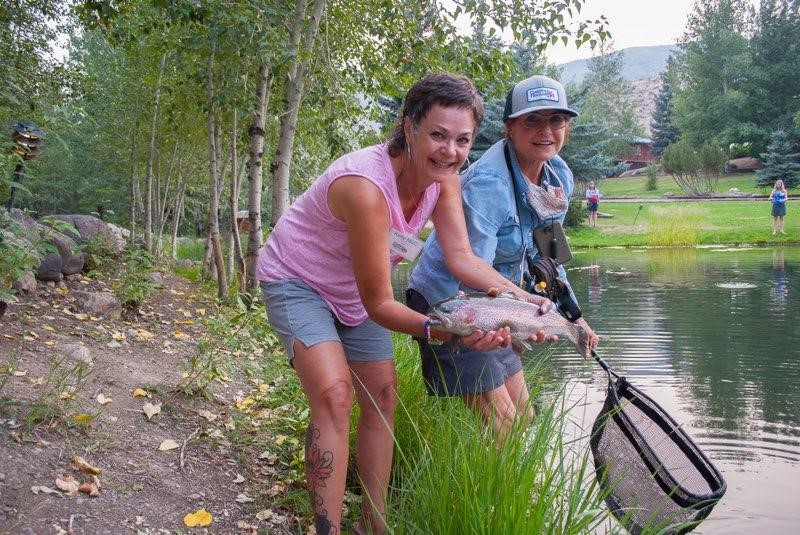 Participants in the 2021 Casting for Recovery retreat enjoy some time on the water