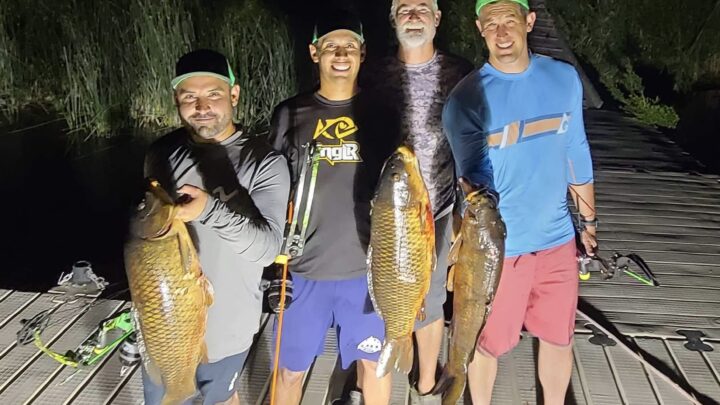 Jordan Rodriguez, Captain Tim Parrish of Hammett Valley Fishing Adventures and friends show off the haul of a night bowfishing on the Snake River