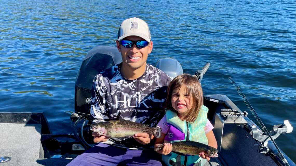 Jordan and Quinn Rodriguez hold rainbow trout caught trolling at Horsethief Reservoir