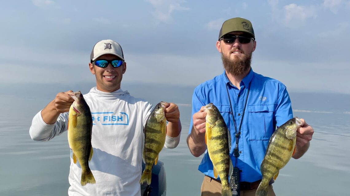 Jordan Rodriguez and Chris Weber show off four jumbo perch caught at Lake Cascade.