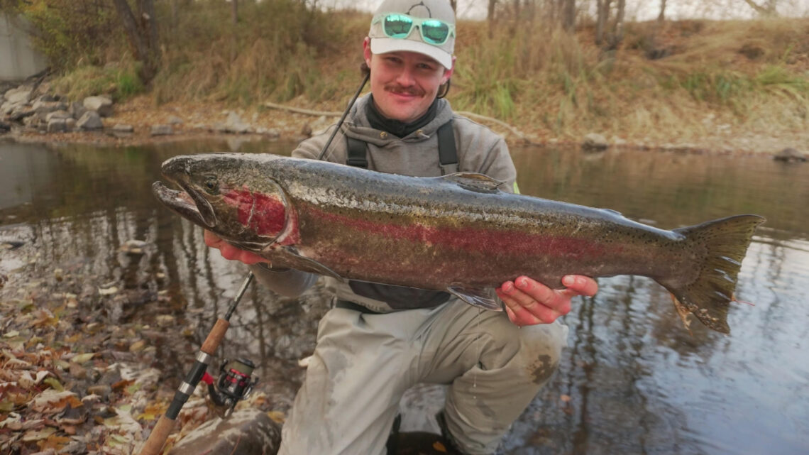 Boise angler Casey Smith shows off a 28-inch steelhead caught in the Boise River