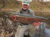 Boise angler Casey Smith shows off a 28-inch steelhead caught in the Boise River