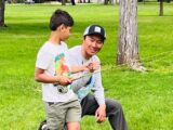 A young boy takes instruction from a Mayfly Project mentor in Boise