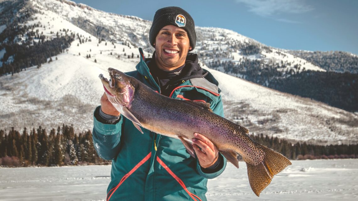Jordan Rodriguez with a 30-inch cutbow trout caught through the ice at Henrys Lake