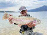 Angler Casey Smith shows off a big rainbow trout caught at Lake Cascade.