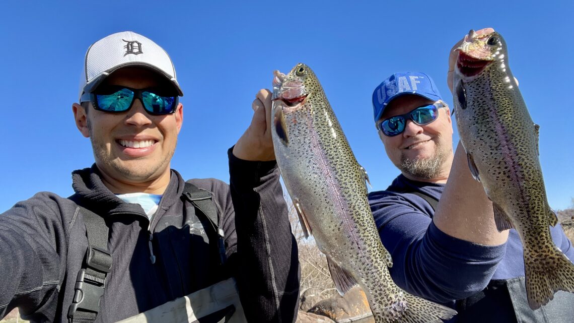 Jordan Rodriguez and Jon Urban show off two nice rainbow trout caught in the Hagerman Valley.