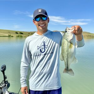 Jordan Rodriguez wearing a Tight Lines 208 fishing hoodie