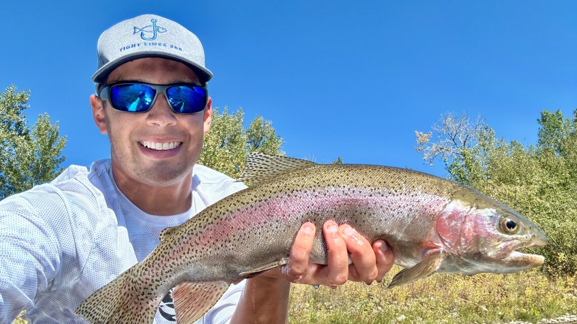 Jordan Rodriguez with a big fall rainbow trout.