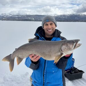 Jordan Rodriguez with a 35-inch Mackinaw trout caught through the ice at Payette Lake.